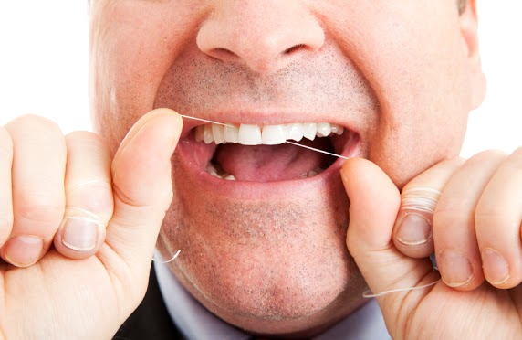How Flossing Effects Bad Breath