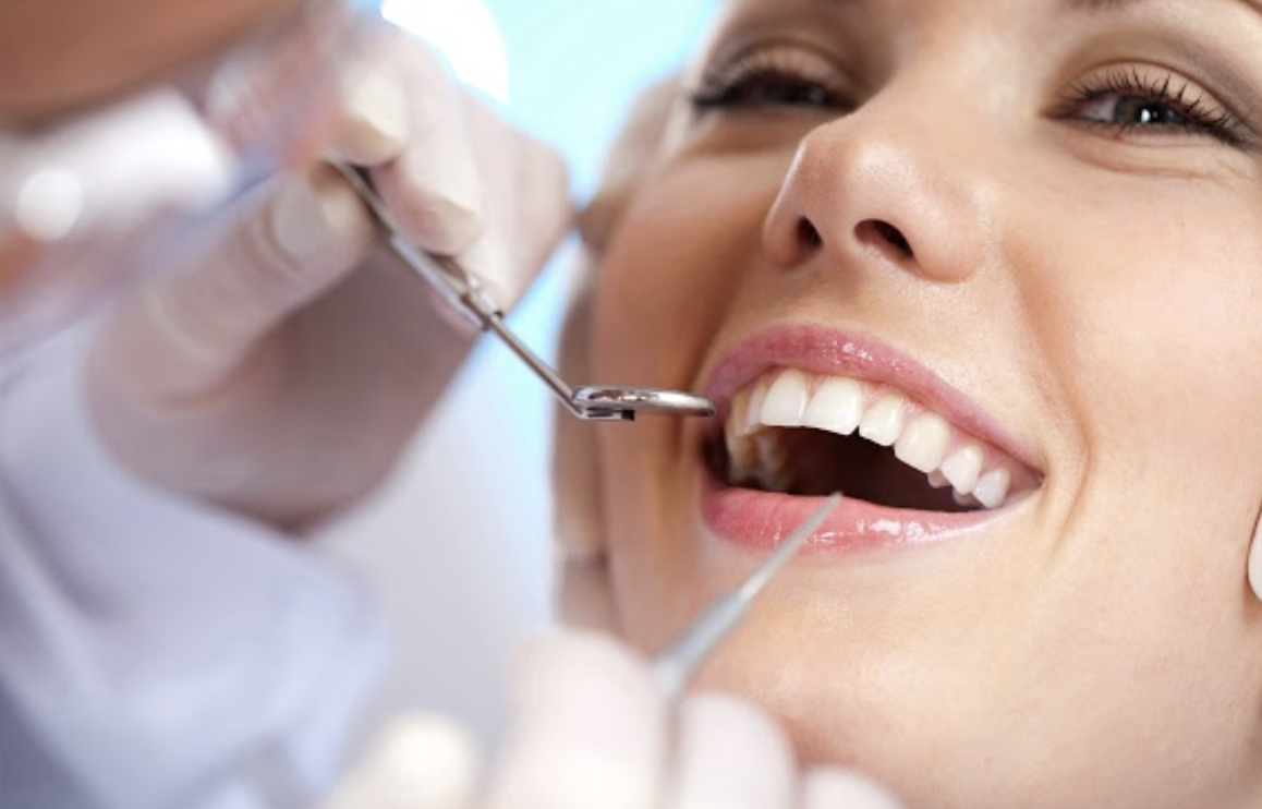 Woman Getting Her Teeth Cleaned